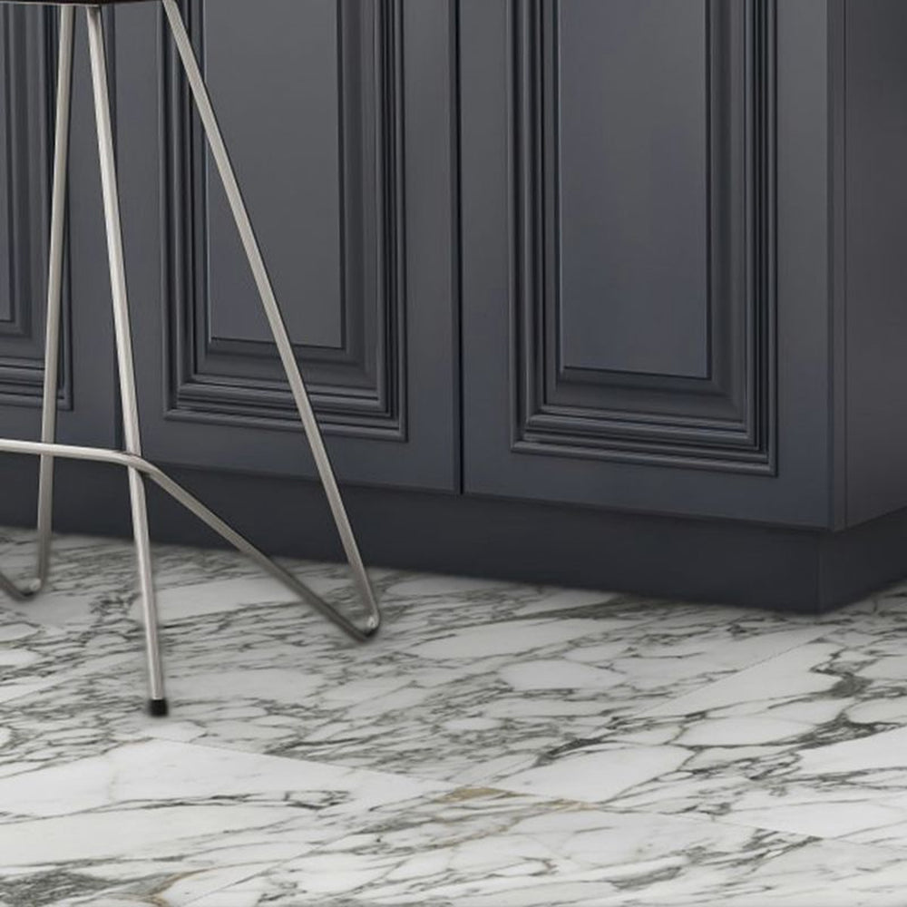 Marble-look tile surface with veining